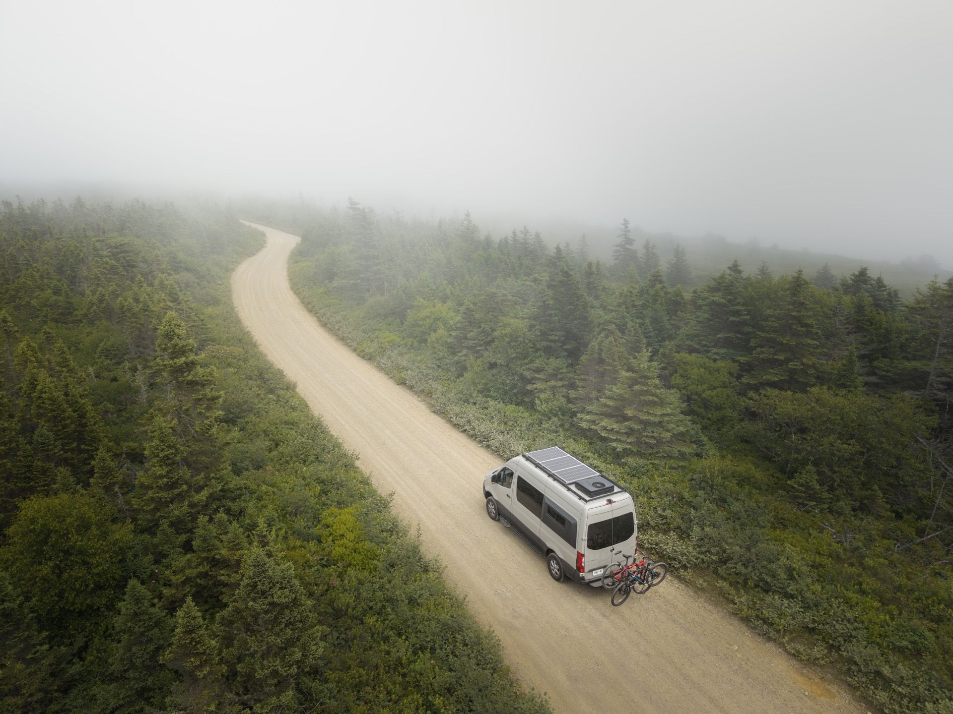 Off-grid campervan parked under open sky
